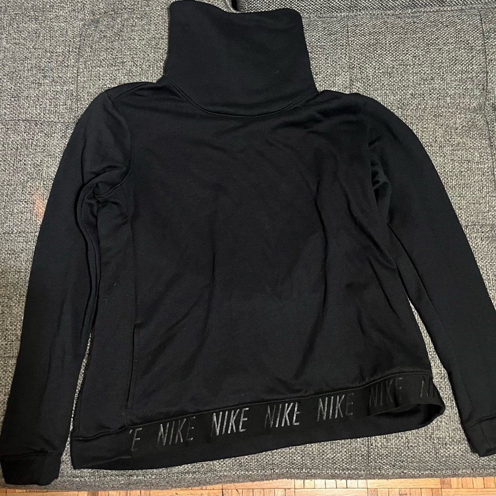 NIKE-used-Women large-black dry fit mock neck sweatshirt. Nike logo front band